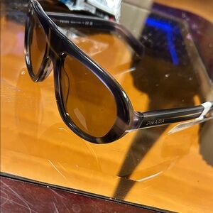 Prada Black Frame Sunglasses with Brown Lenses